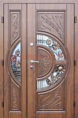 Уличная дверь в цвете Итальянский орех с виноритом и ковкой со стеклом ДВТ-147 в Краснодаре